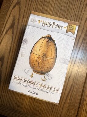 Charmed Aroma Harry Potter Metallic Gold Egg Candle with golden egg necklace